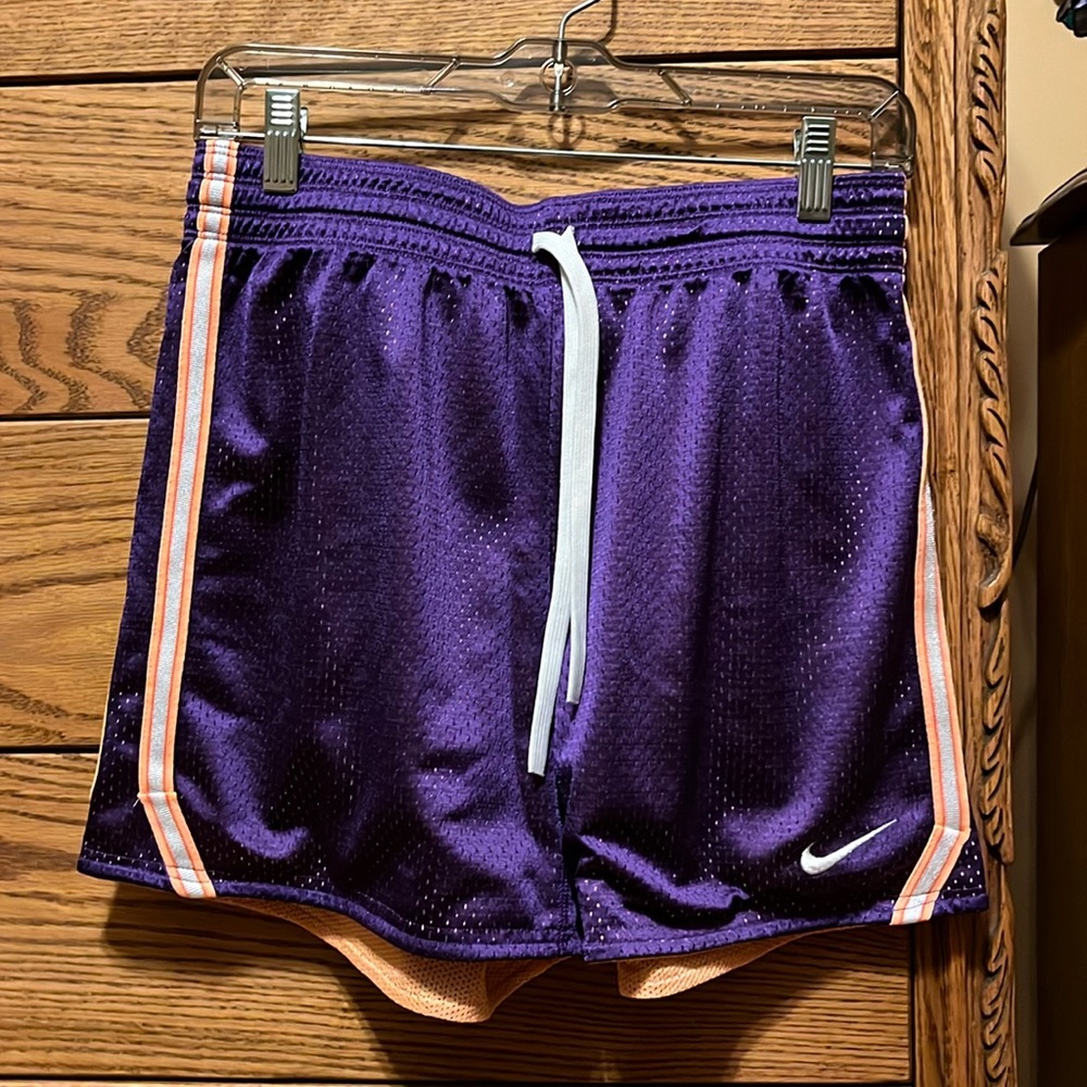 Women’s purple and orange Nike shorts